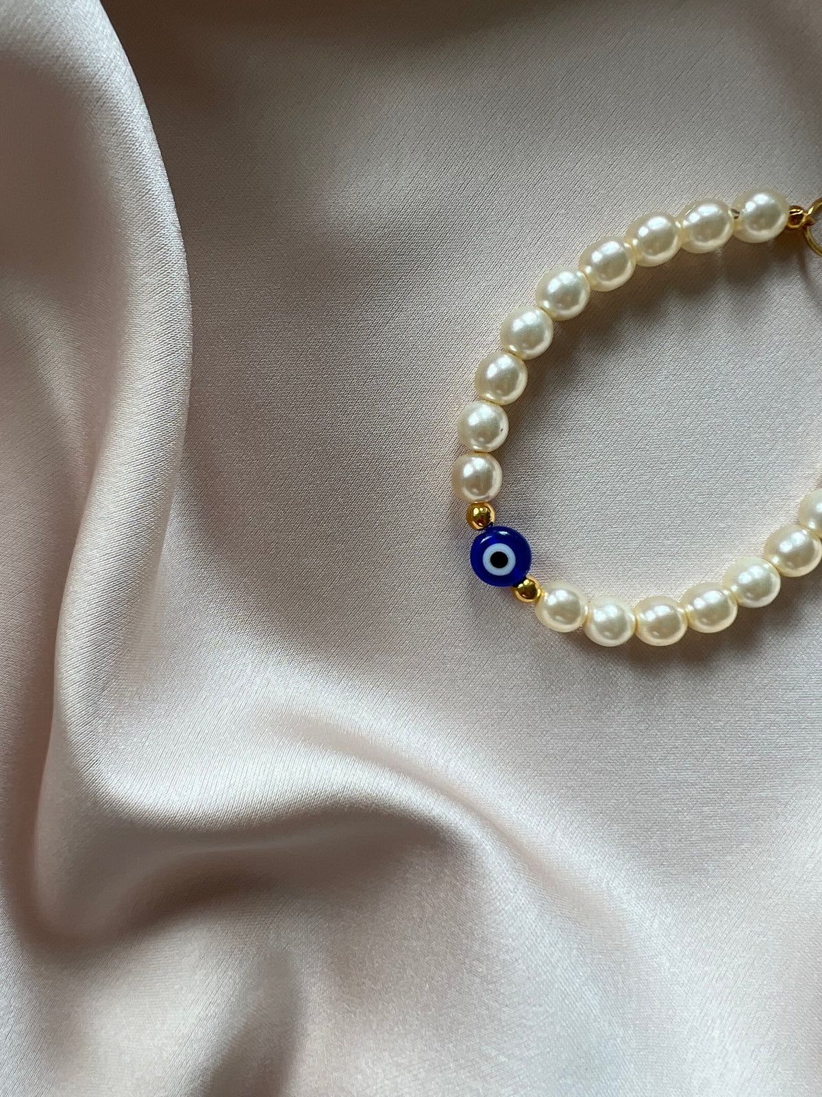 Evil Eye Pearl Charm Bracelet
