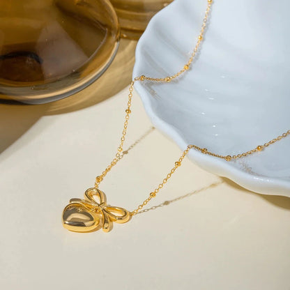 Bella bow and heart necklace