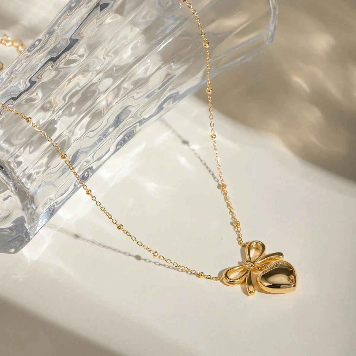 Bella bow and heart necklace