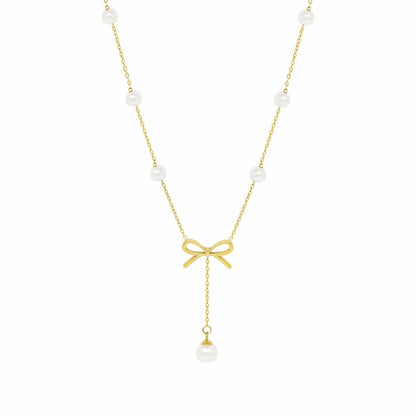 Bow pearl drop necklace